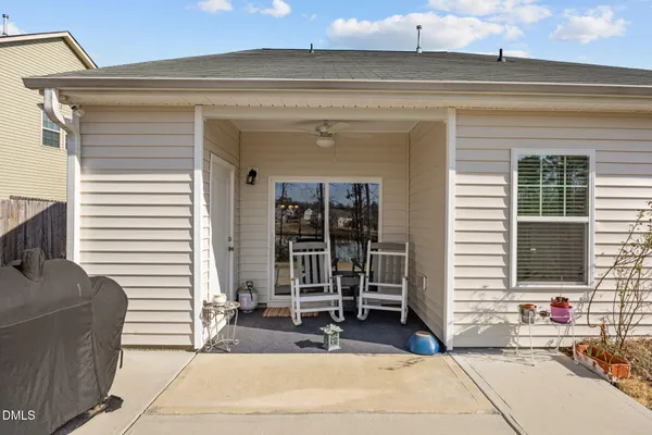a front view of a house with a patio