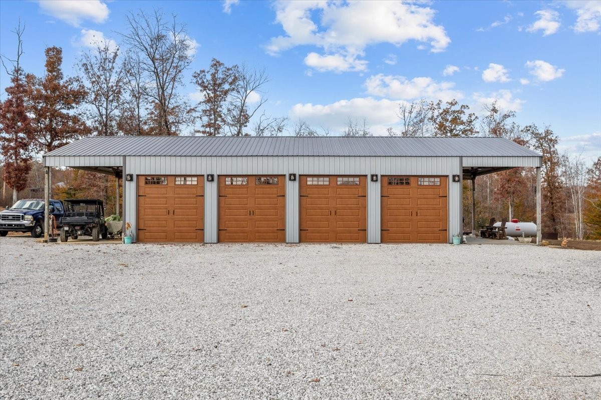 120 Fiser Road Waverly, TN 37185 - Photo 31 of 46 a very nice looking house with a large window and yard