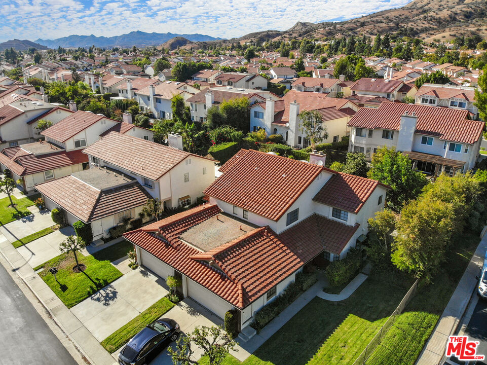 19401 Crystal Ridge Lane Porter Ranch, CA 91326 - Photo 2 of 45 an aerial view of a houses with a city view