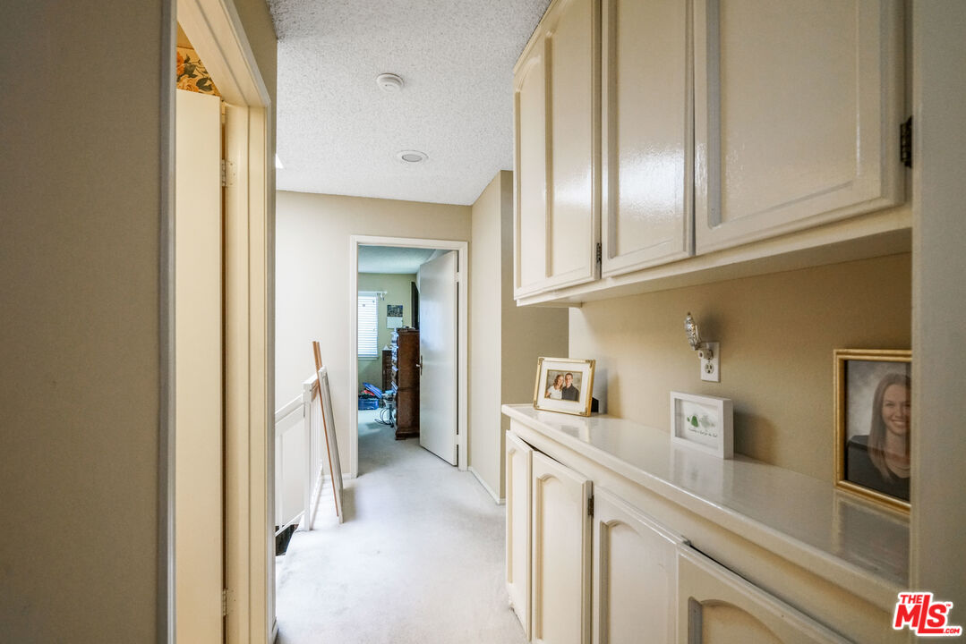 19401 Crystal Ridge Lane Porter Ranch, CA 91326 - Photo 31 of 45 a view of a kitchen from the hallway