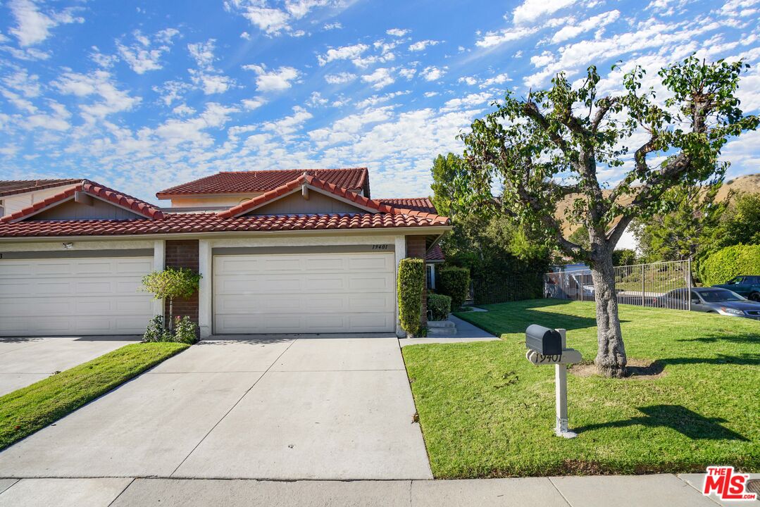 19401 Crystal Ridge Lane Porter Ranch, CA 91326 - Photo 44 of 45 a front view of a house with yard