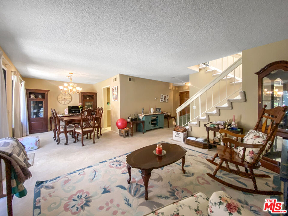 19401 Crystal Ridge Lane Porter Ranch, CA 91326 - Photo 10 of 45 a living room with furniture and next to a window