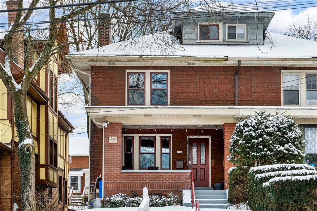a view of a house with a large windows