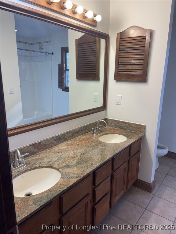 609 Georgetown Circle Fayetteville, NC 28314 - Photo 15 of 36 a bathroom with a granite countertop sink and a mirror