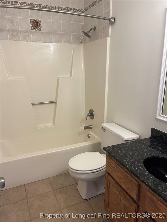 609 Georgetown Circle Fayetteville, NC 28314 - Photo 27 of 36 a bathroom with a granite countertop toilet a sink and bathtub