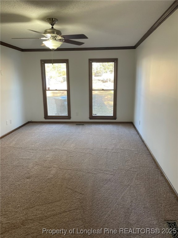 609 Georgetown Circle Fayetteville, NC 28314 - Photo 10 of 36 a view of empty room with windows
