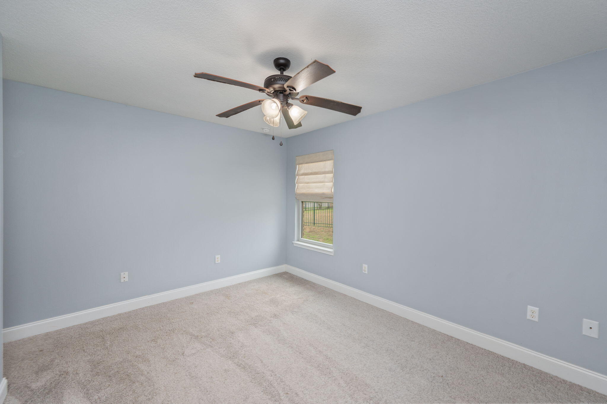 2909 Chancery Lane Crestview, FL 32539 - Photo 27 of 34 a view of room with a ceiling fan and a window