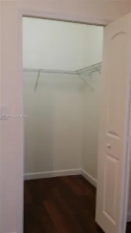 a view of a room that has a window in it