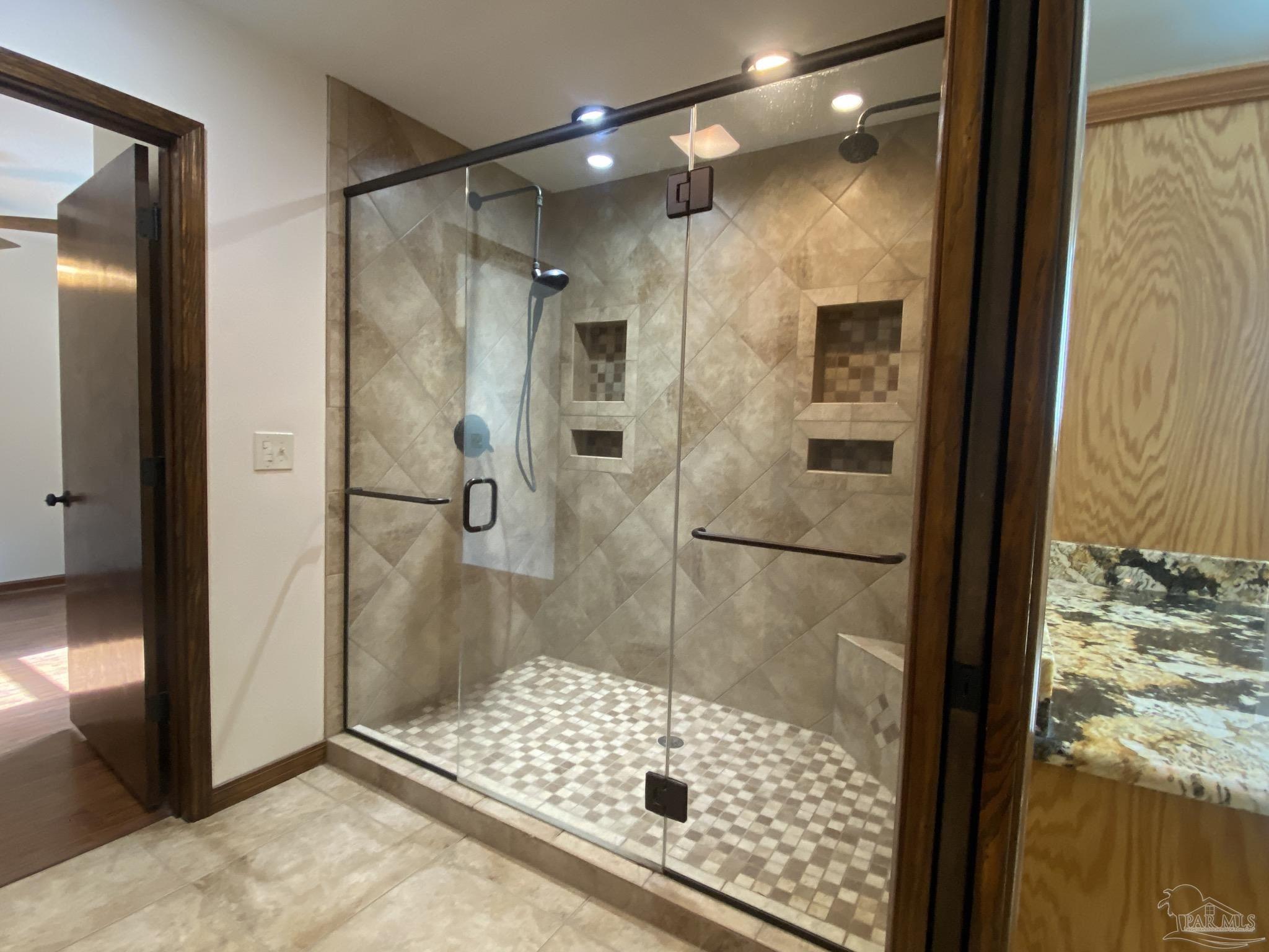 9141 Frank Pitman Road Milton, FL 32570 - Photo 36 of 51 a bathroom with a shower and a sink