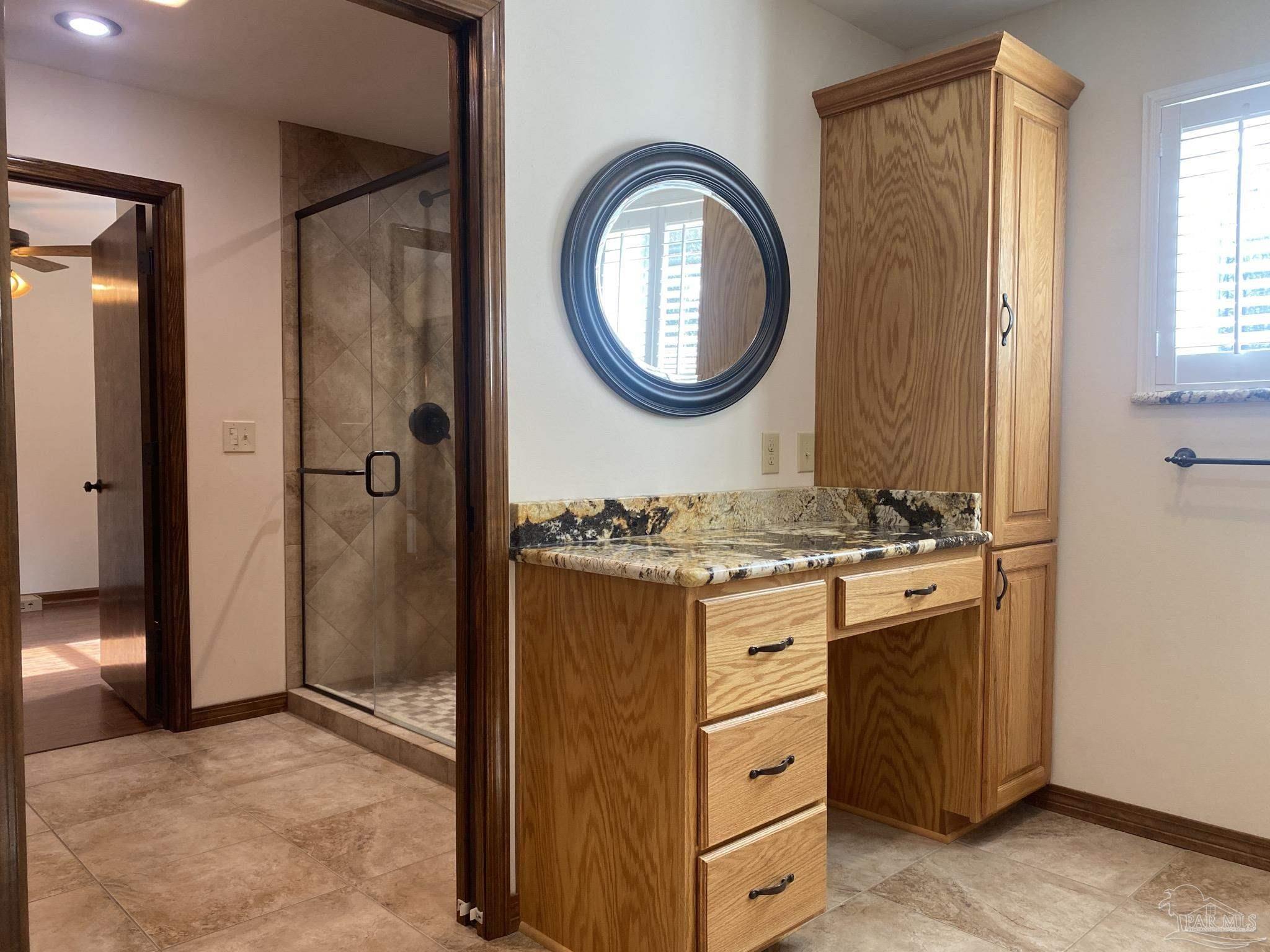 9141 Frank Pitman Road Milton, FL 32570 - Photo 38 of 51 a view of a kitchen with a stove top oven