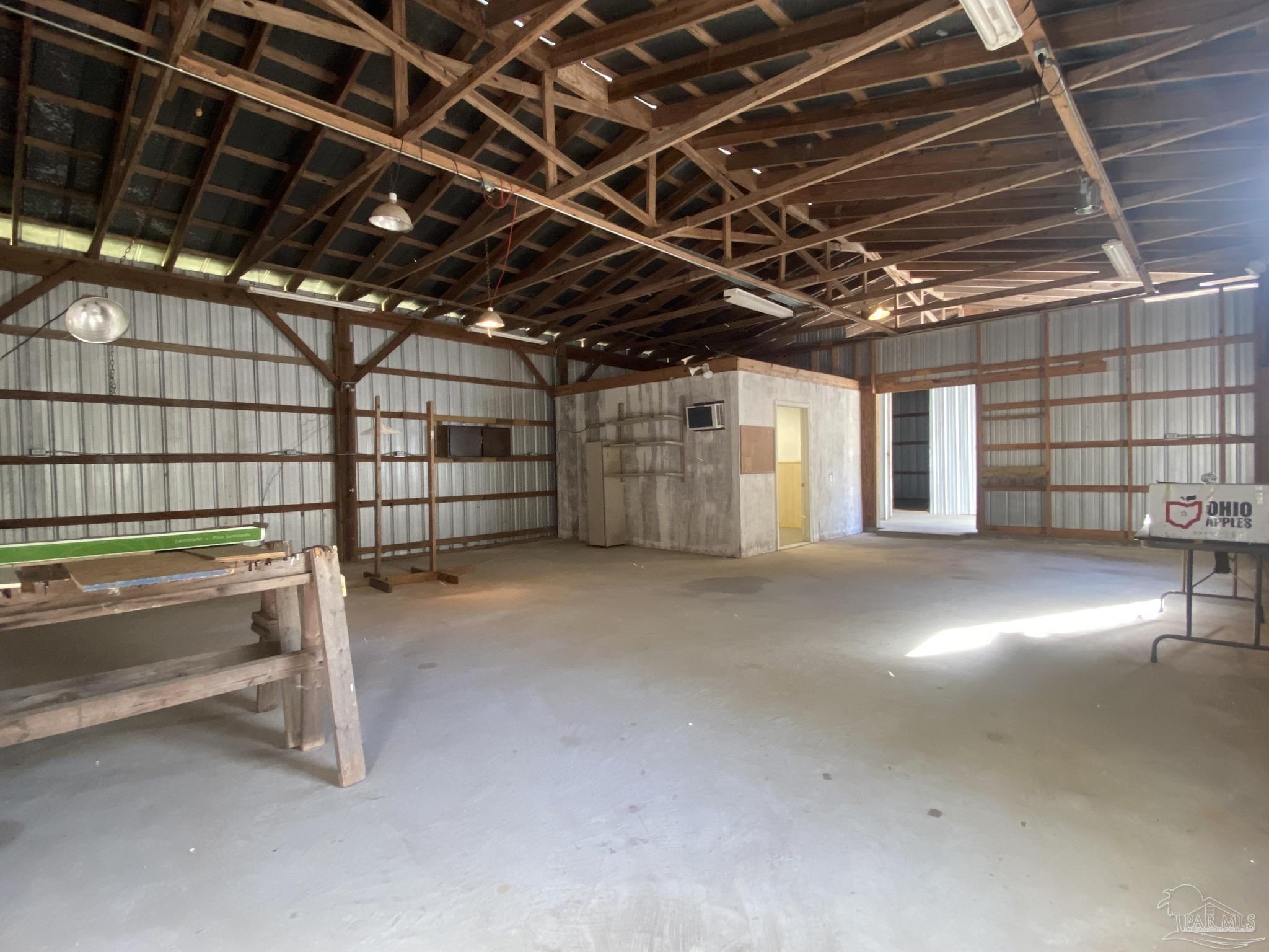 9141 Frank Pitman Road Milton, FL 32570 - Photo 42 of 51 a view of empty room with windows