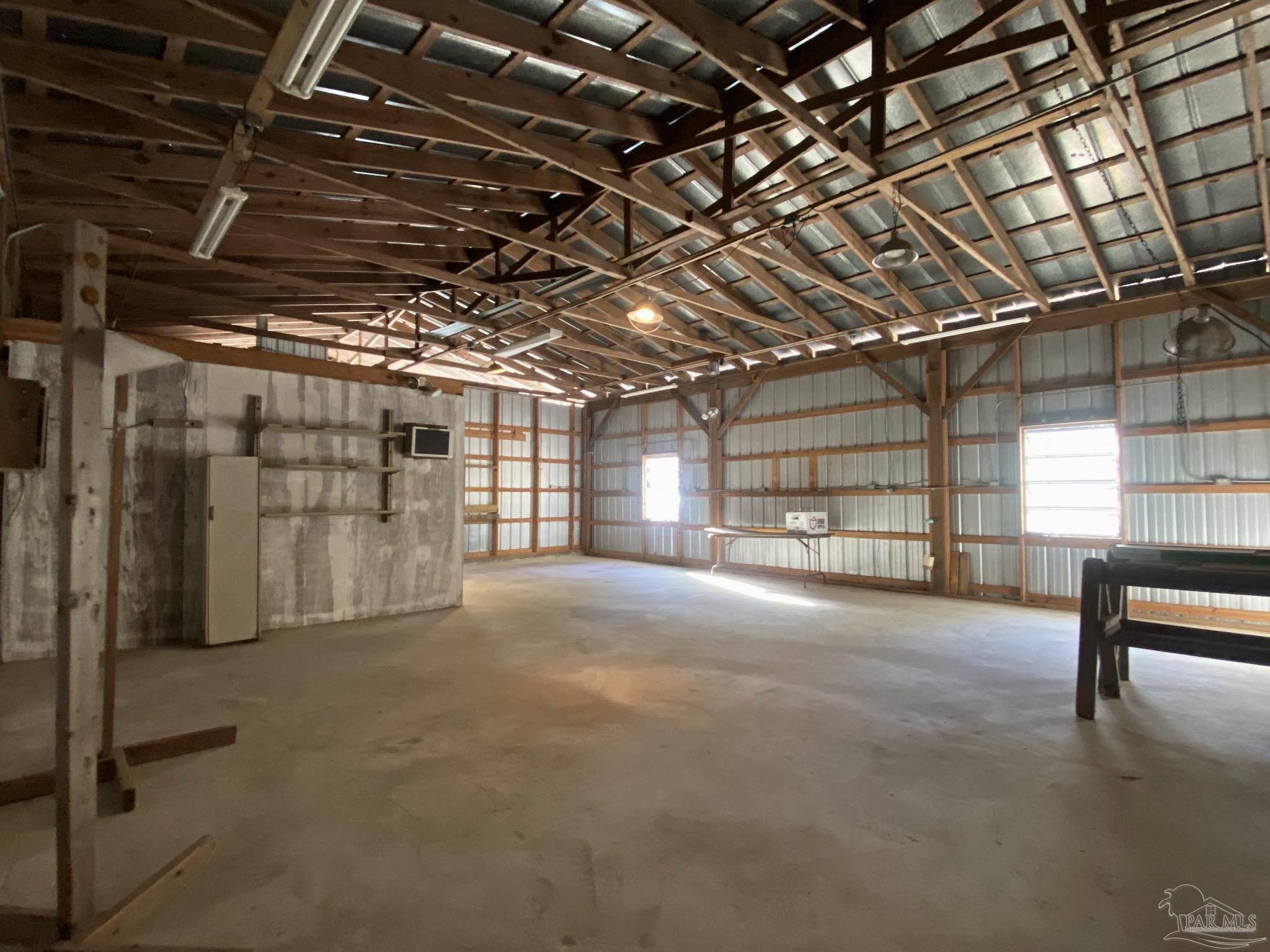 9141 Frank Pitman Road Milton, FL 32570 - Photo 43 of 51 a view of empty room with windows
