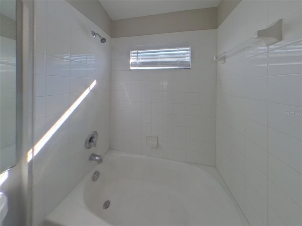 Undisclosed Address Ruskin, FL 33570 - Photo 15 of 16 a bathroom with a bathtub