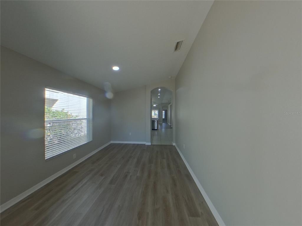 Undisclosed Address Ruskin, FL 33570 - Photo 5 of 16 a view of empty room with window