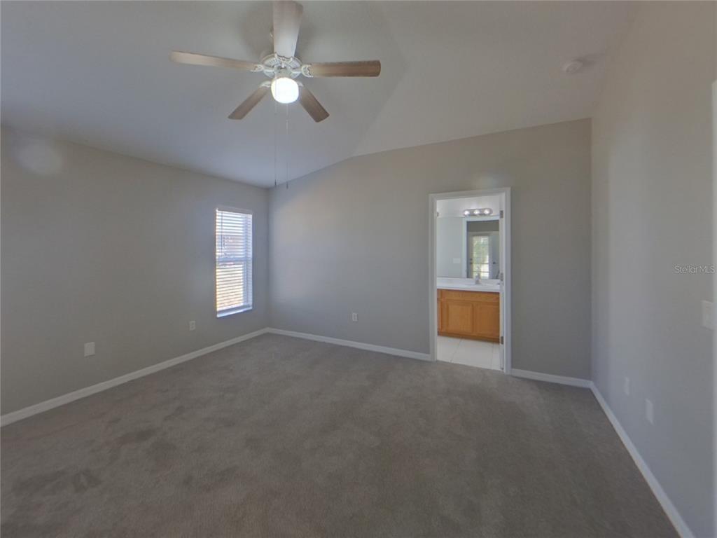 Undisclosed Address Ruskin, FL 33570 - Photo 9 of 16 a view of an empty room with a window