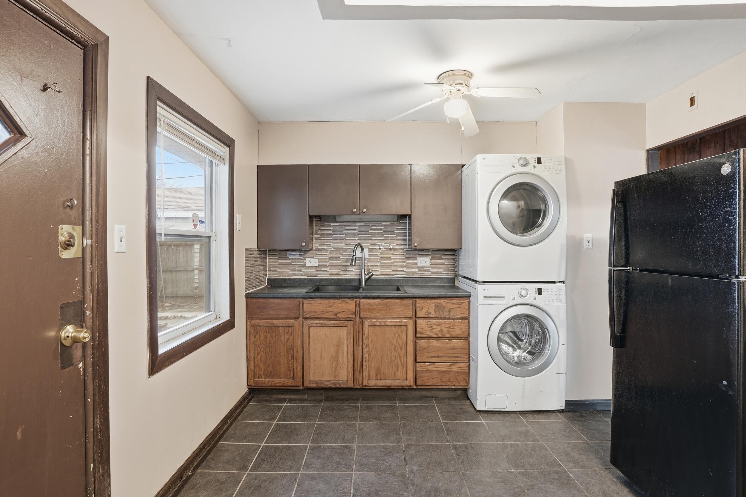 1620 180th Place Hammond, IN 46324 - Photo 11 of 19 a utility room with dryer and washer