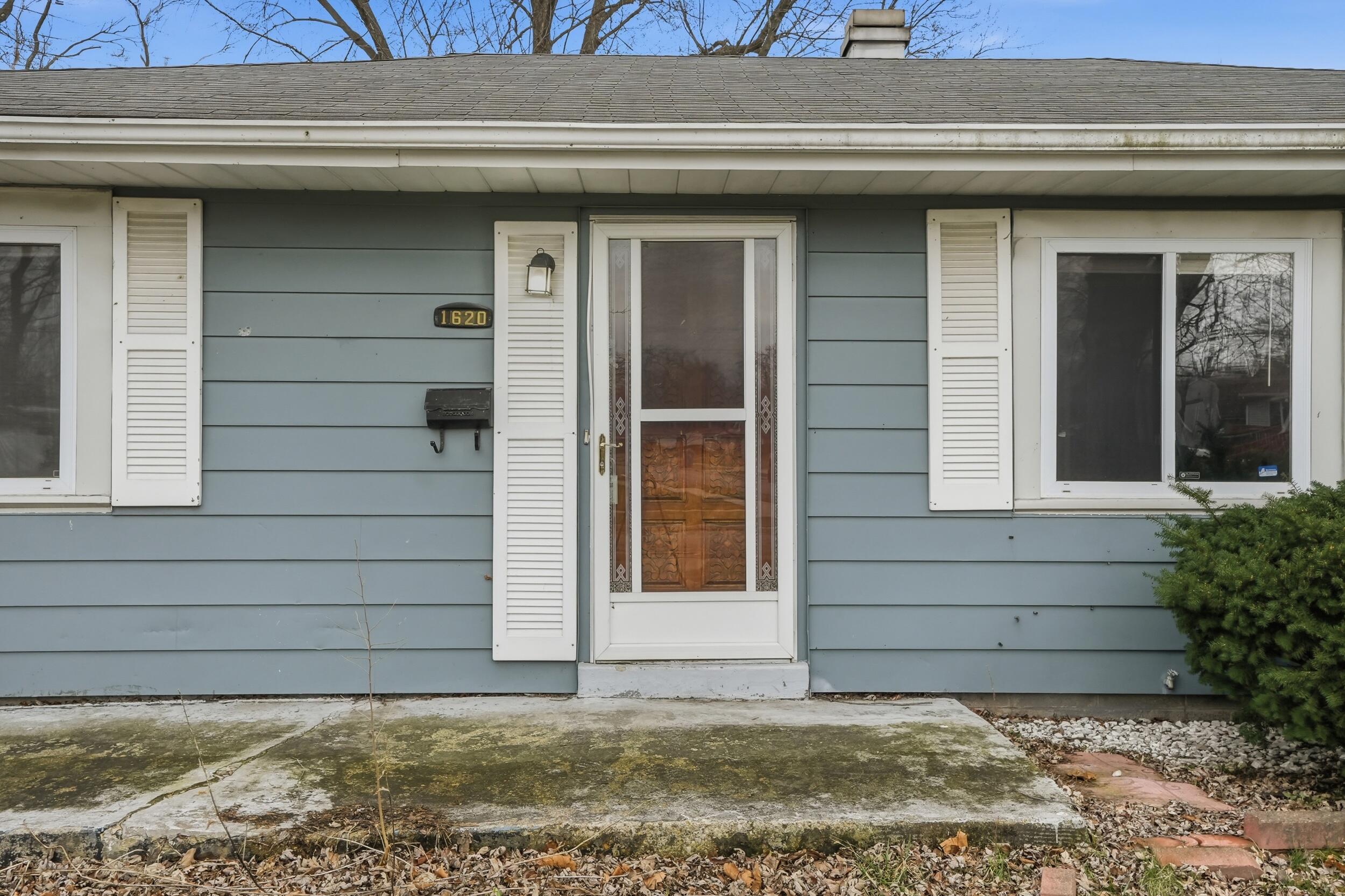 1620 180th Place Hammond, IN 46324 - Photo 5 of 19 a view of house with garage