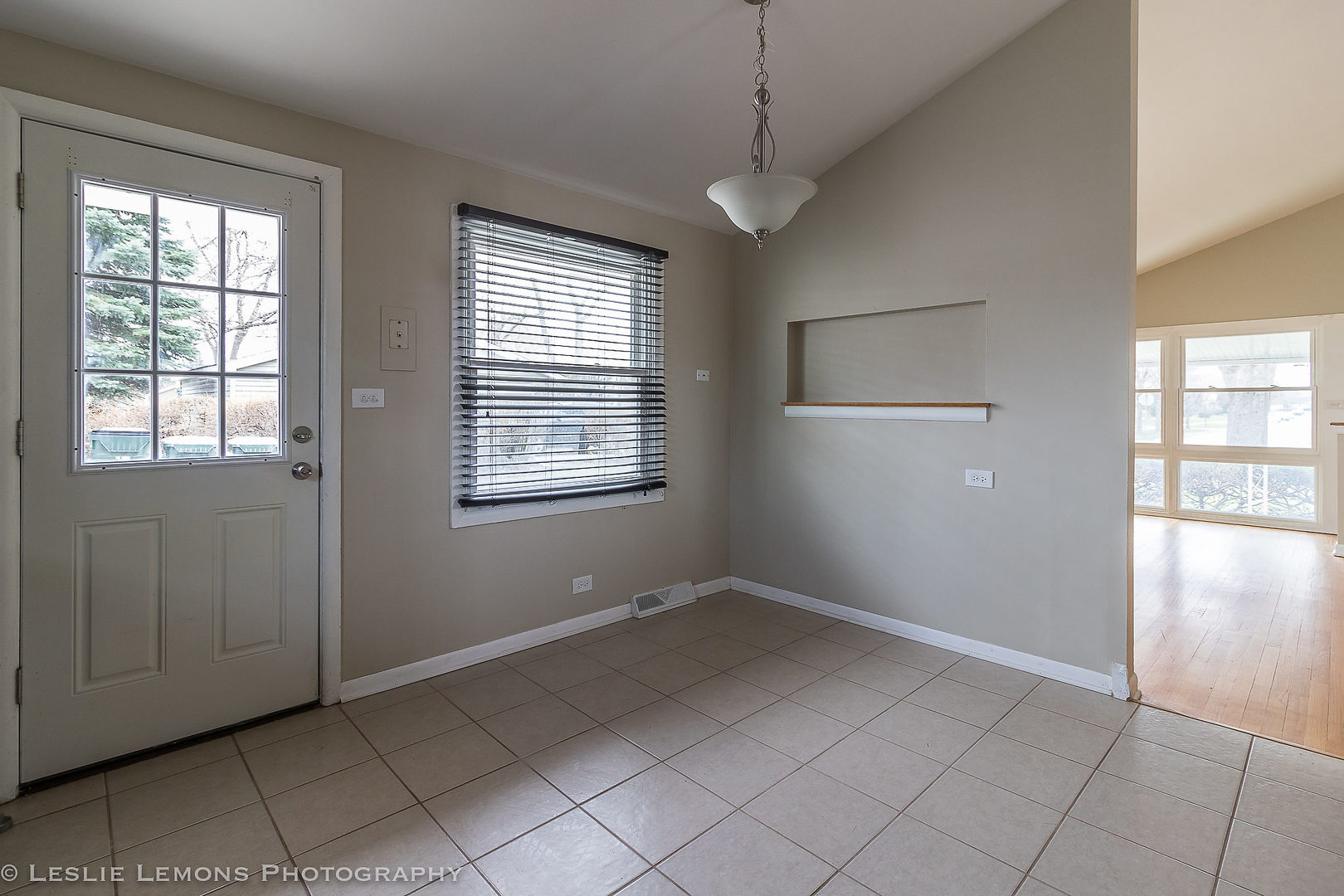 8541 North Shermer Road Niles, IL 60714 - Photo 9 of 26 a view of an empty room with a window