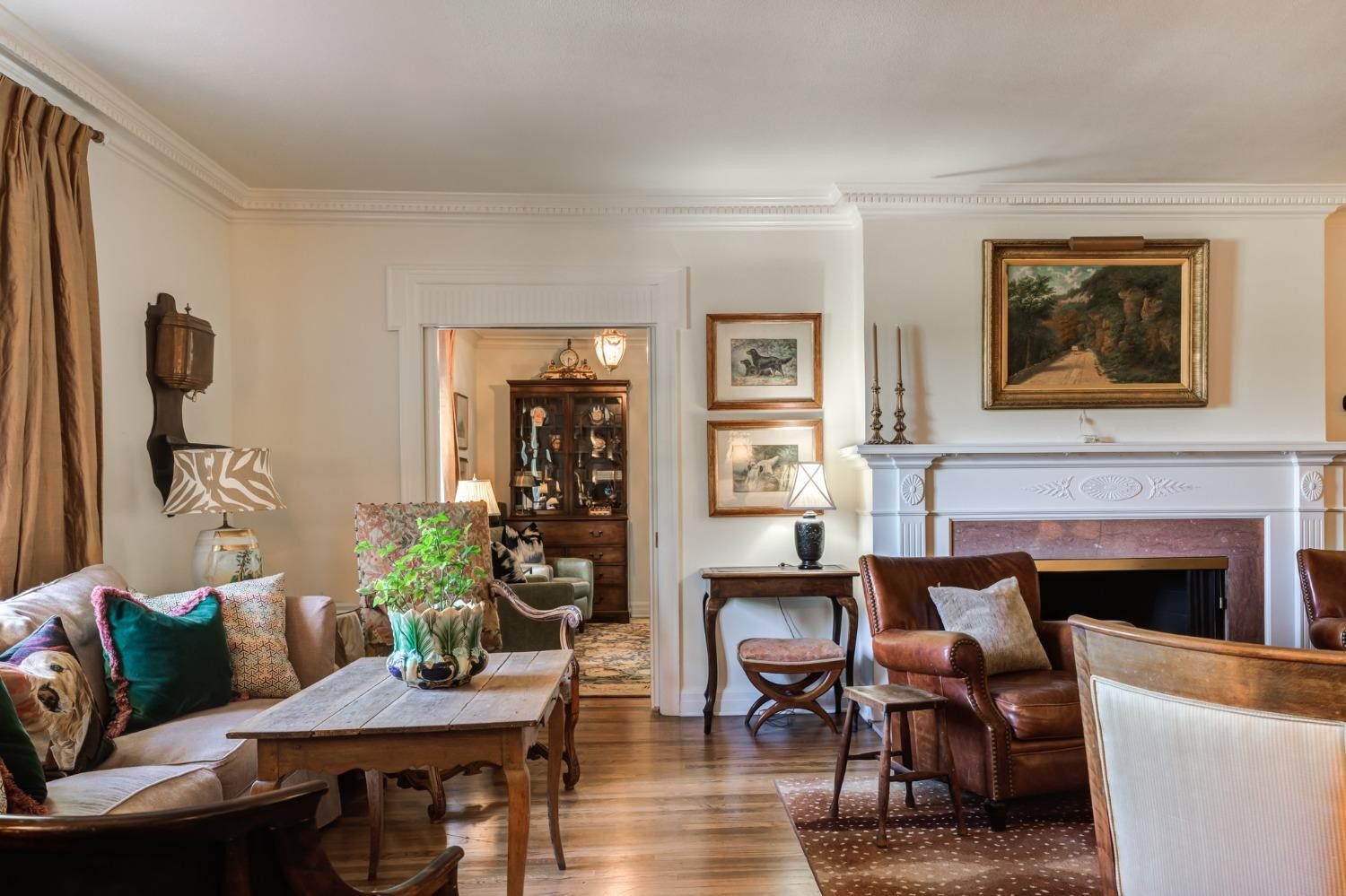 4909 19th Street Lubbock, TX 79407 - Photo 12 of 50 a living room with furniture and a fireplace