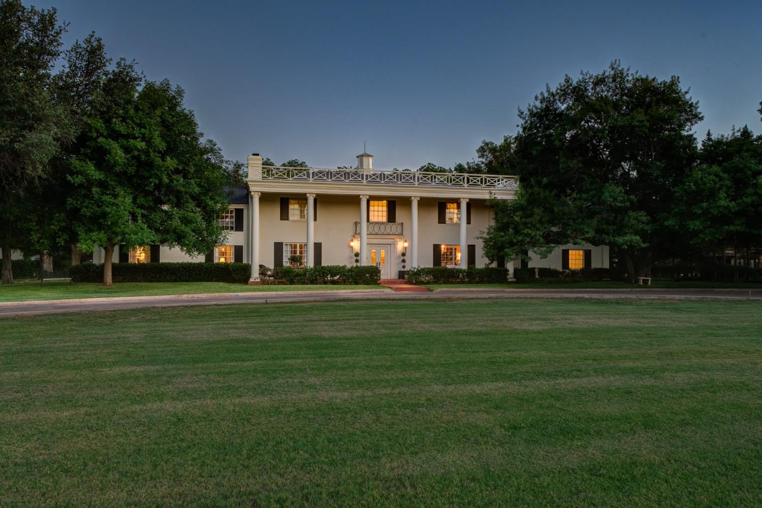 4909 19th Street Lubbock, TX 79407 - Photo 2 of 50 a front view of a house with a yard