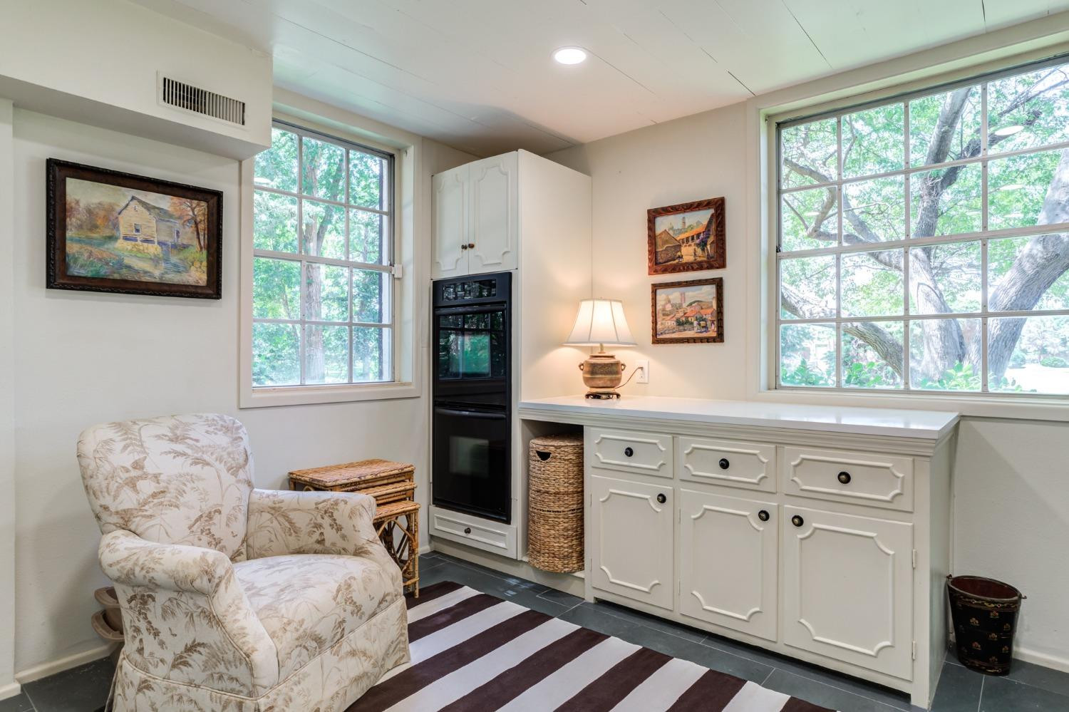 4909 19th Street Lubbock, TX 79407 - Photo 38 of 50 a living room with furniture and windows