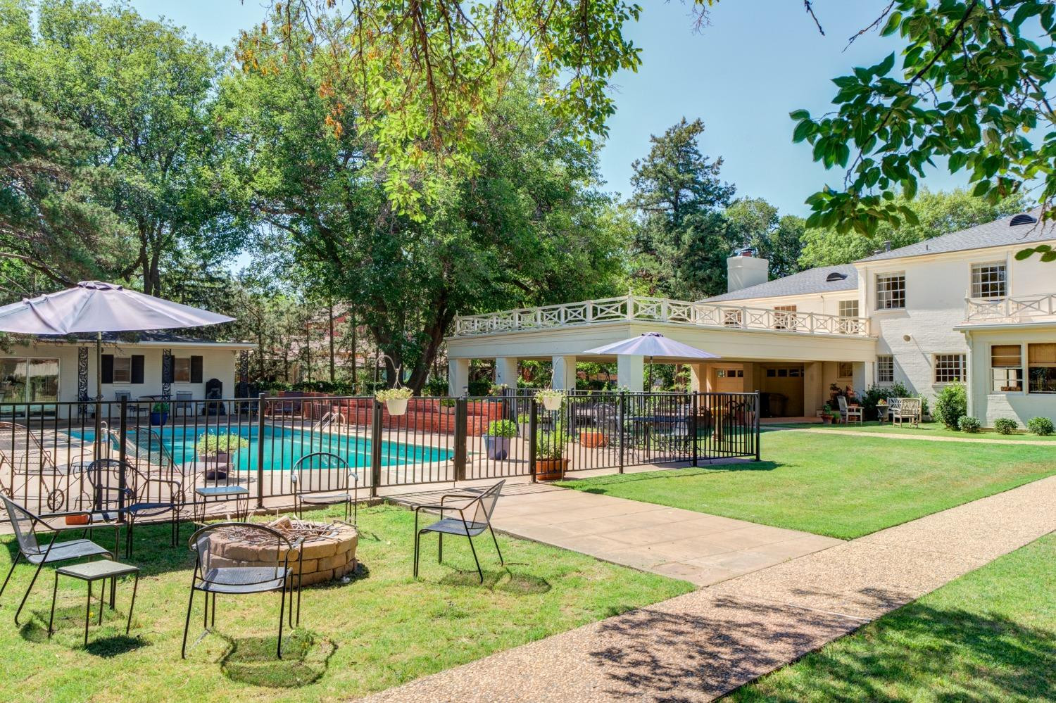 4909 19th Street Lubbock, TX 79407 - Photo 40 of 50 a view of a patio with a table and a chairs