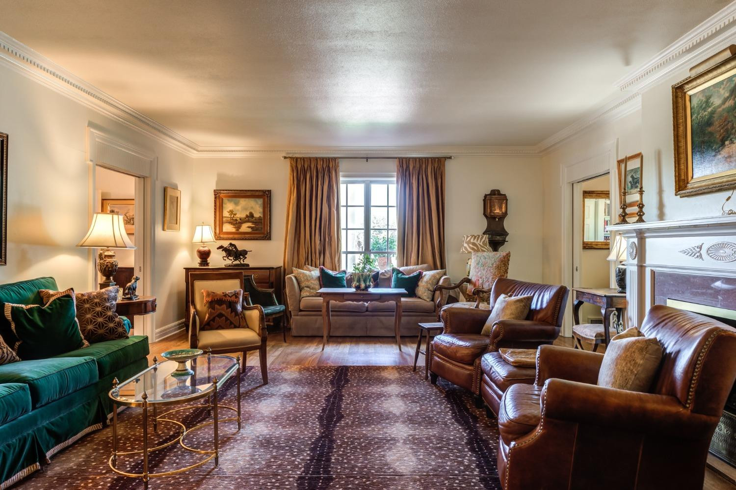 4909 19th Street Lubbock, TX 79407 - Photo 10 of 50 a living room with furniture fireplace and a window