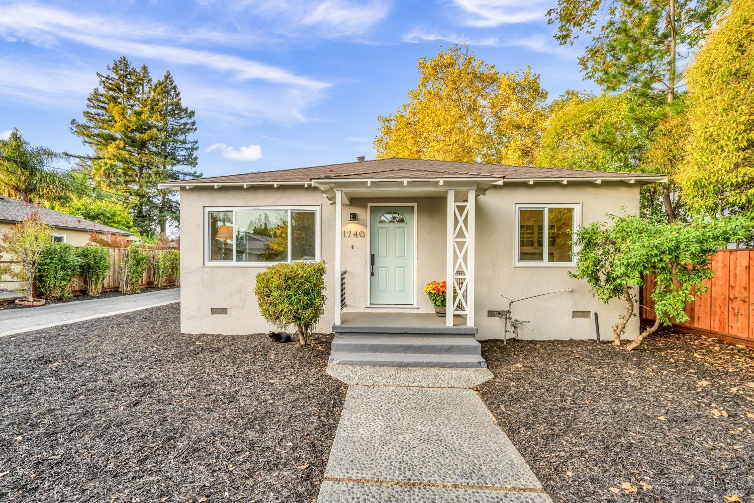 a view of a house with a garden
