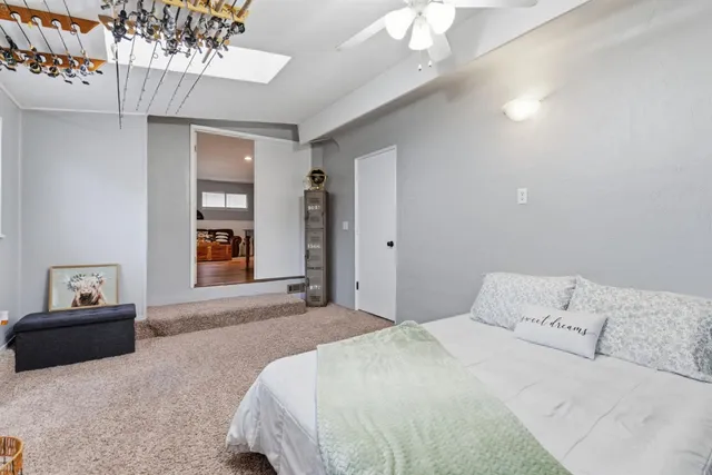 a view of a livingroom and a livingroom with furniture