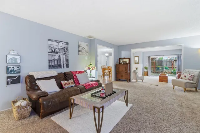 a living room with furniture and a couch