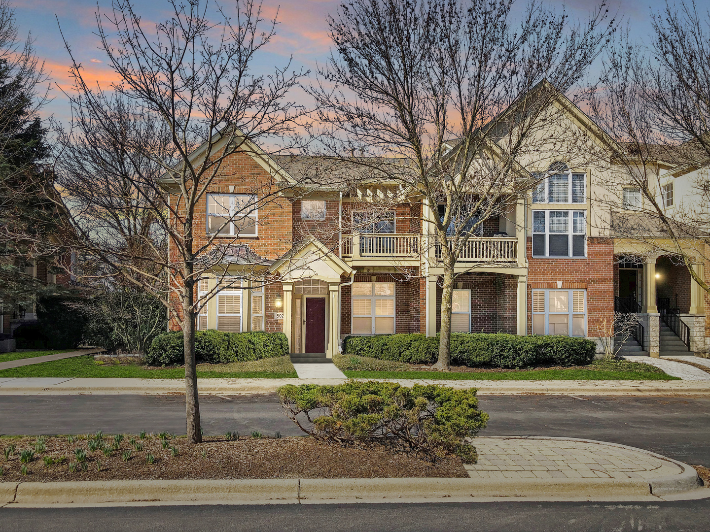 502 South Commons Court, Unit 502 Deerfield, IL 60015 - Photo 1 of 33 a front view of house with a yard