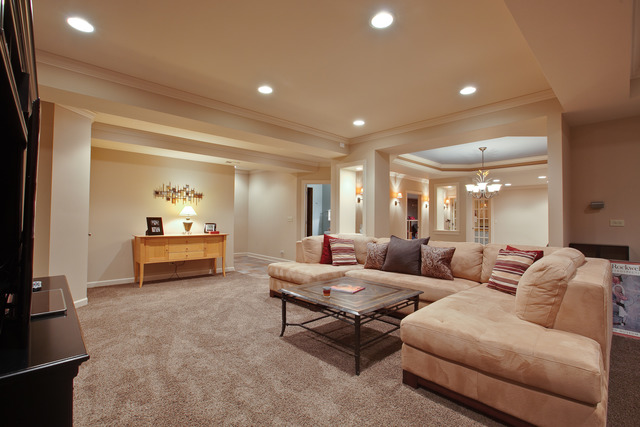 502 South Commons Court, Unit 502 Deerfield, IL 60015 - Photo 20 of 33 a living room with furniture and a chandelier