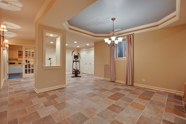 502 South Commons Court, Unit 502 Deerfield, IL 60015 - Photo 22 of 33 a view of a hallway with a chandelier