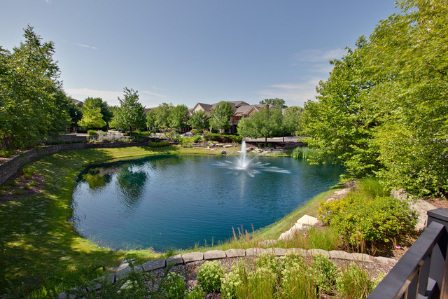 502 South Commons Court, Unit 502 Deerfield, IL 60015 - Photo 29 of 33 a view of a lake in between two chairs