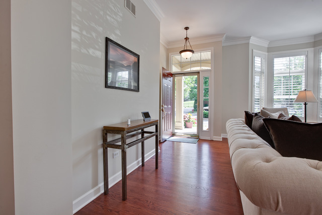 502 South Commons Court, Unit 502 Deerfield, IL 60015 - Photo 5 of 33 a living room with furniture window and wooden floor