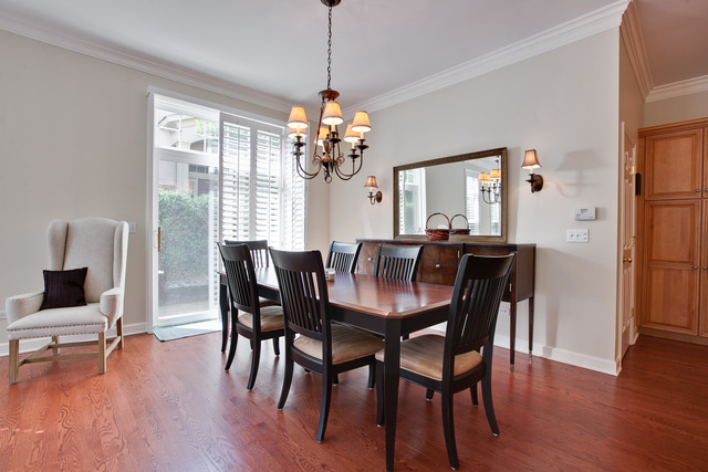 502 South Commons Court, Unit 502 Deerfield, IL 60015 - Photo 8 of 33 a view of a dining room with furniture window and wooden floor