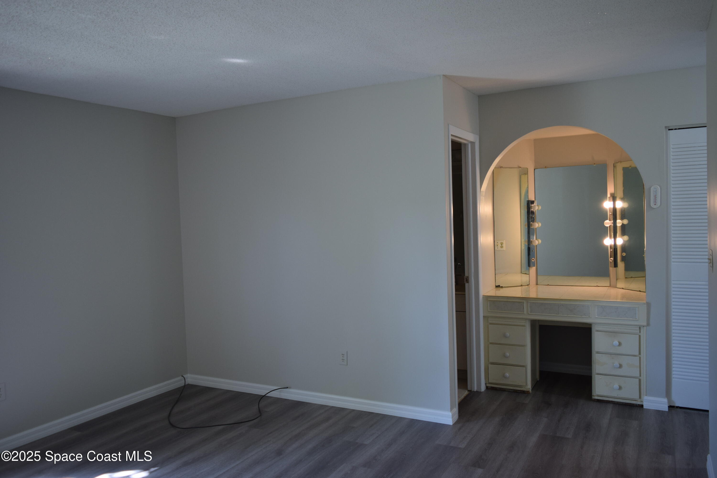 2696 Yalta Street Northeast Palm Bay, FL 32905 - Photo 13 of 28 a view of a livingroom with wooden floor