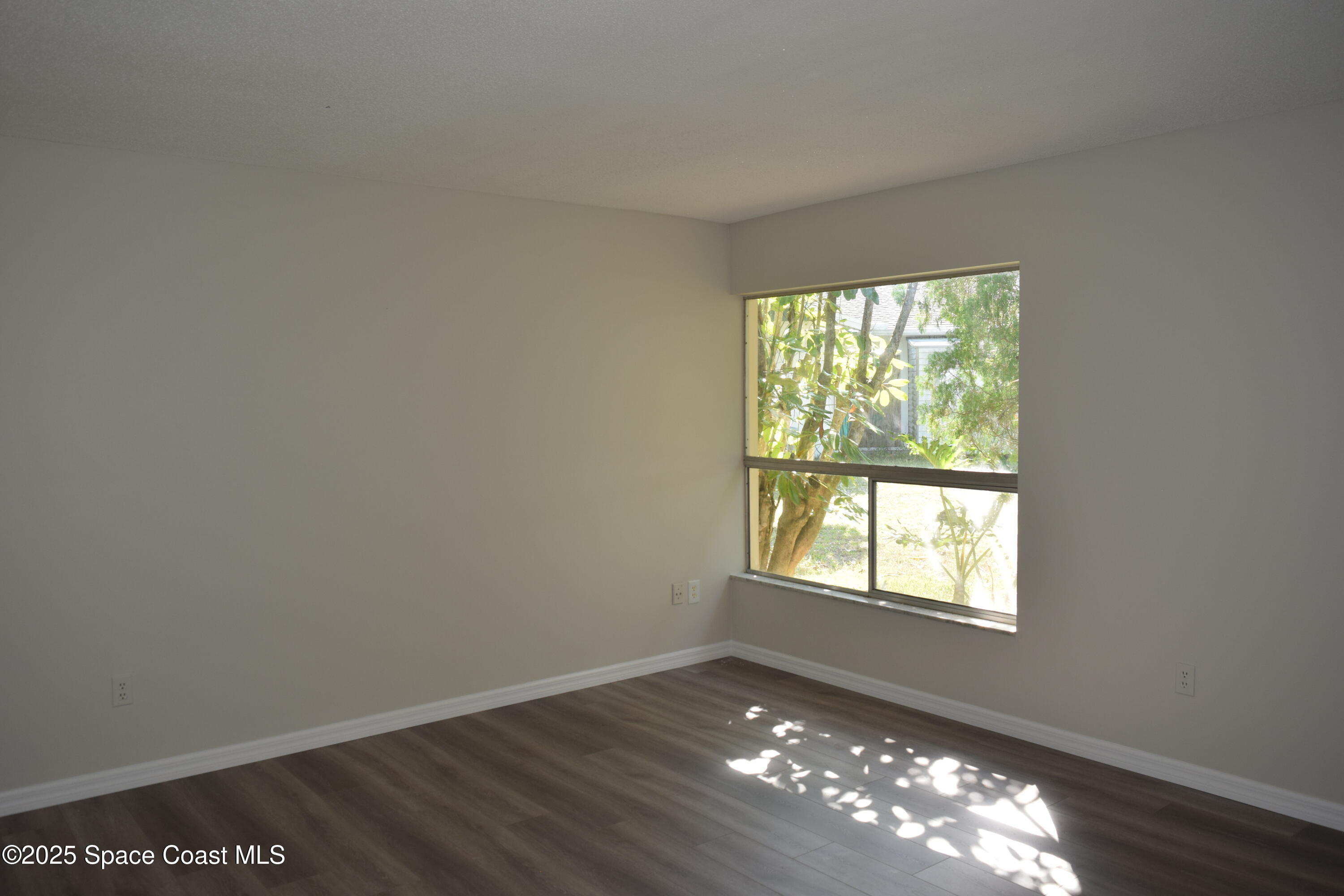 2696 Yalta Street Northeast Palm Bay, FL 32905 - Photo 15 of 28 a view of livingroom with window