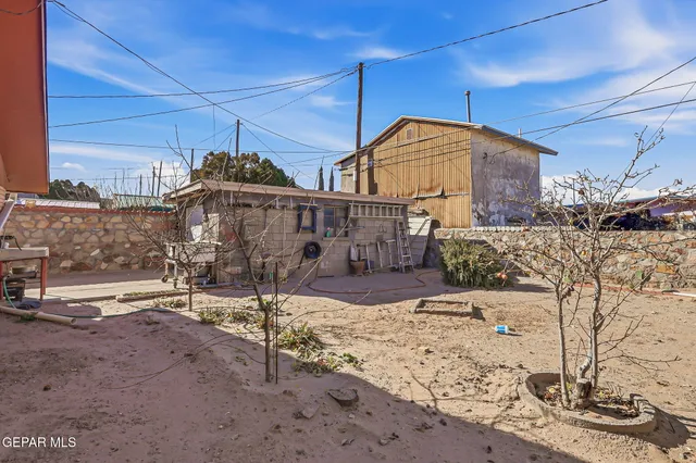 a hallway with a black white checkered floor
