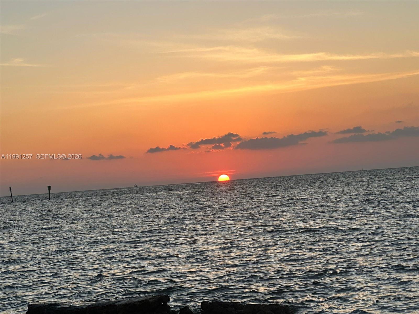 1660 Renaissance Commons Boulevard, Unit 2606 Boynton Beach, FL 33426 - Photo 1 of 26 a view of ocean and sunset