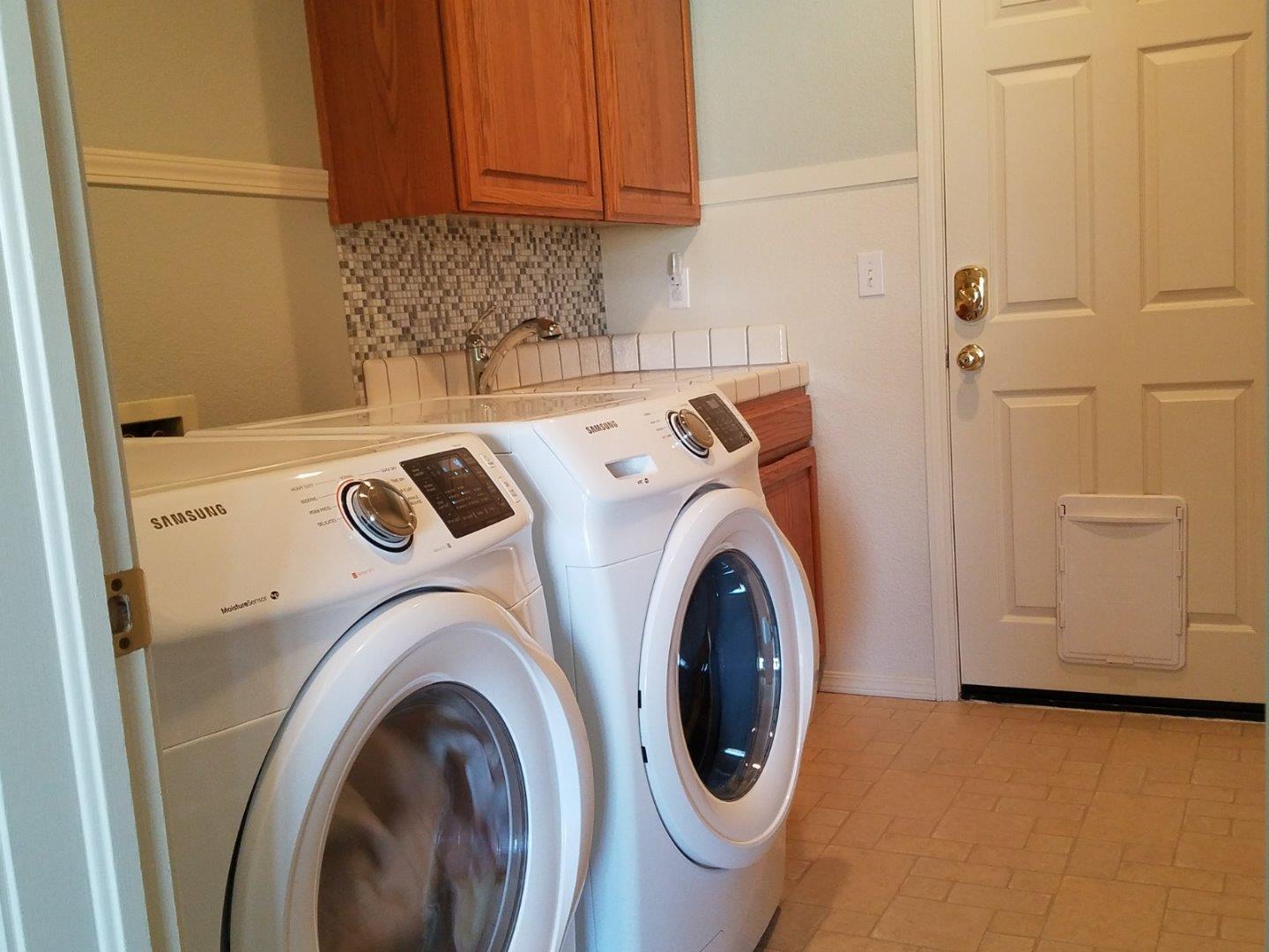 148 Greenbriar Way Salinas, CA 93907 - Photo 12 of 29 a utility room with dryer and washer