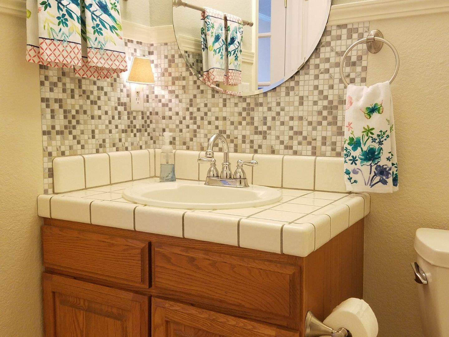 148 Greenbriar Way Salinas, CA 93907 - Photo 13 of 29 a bathroom with a sink and a toilet