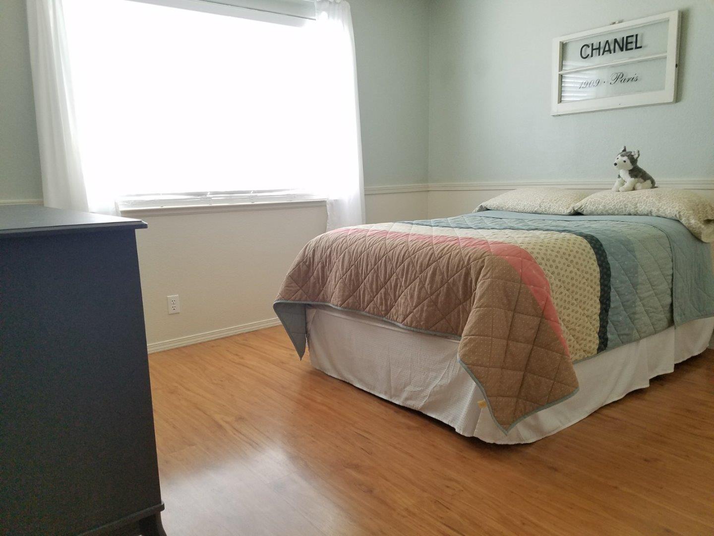 148 Greenbriar Way Salinas, CA 93907 - Photo 19 of 29 a bed sitting in a bedroom next to a window