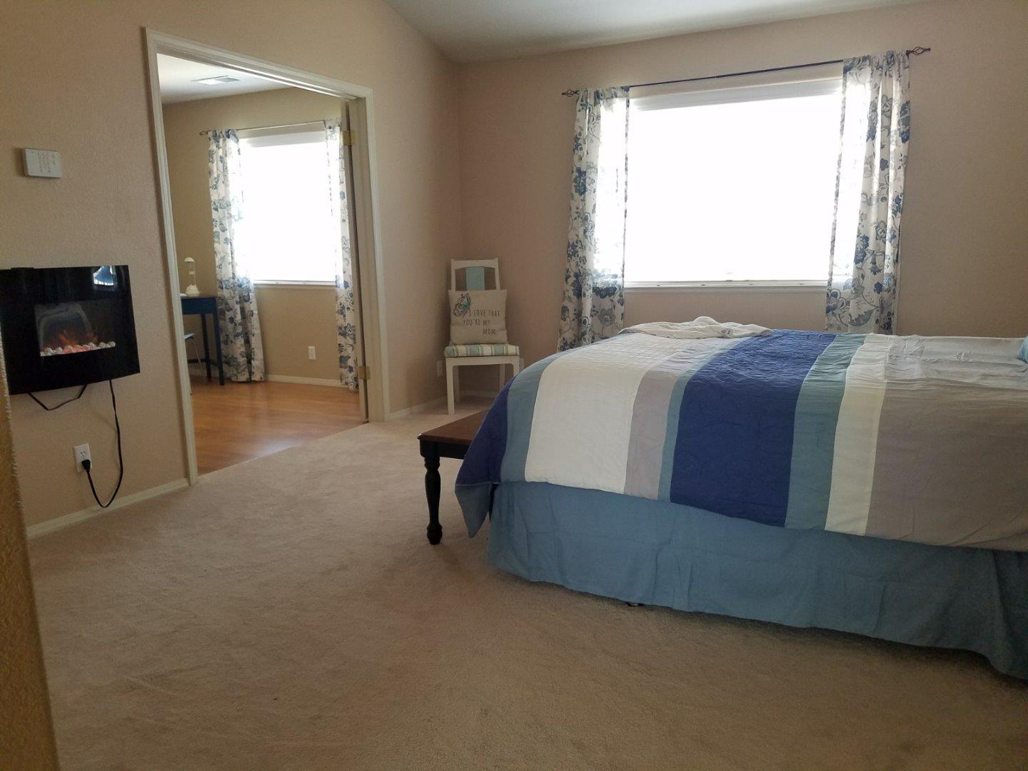 148 Greenbriar Way Salinas, CA 93907 - Photo 24 of 29 a bedroom with a bed and a television