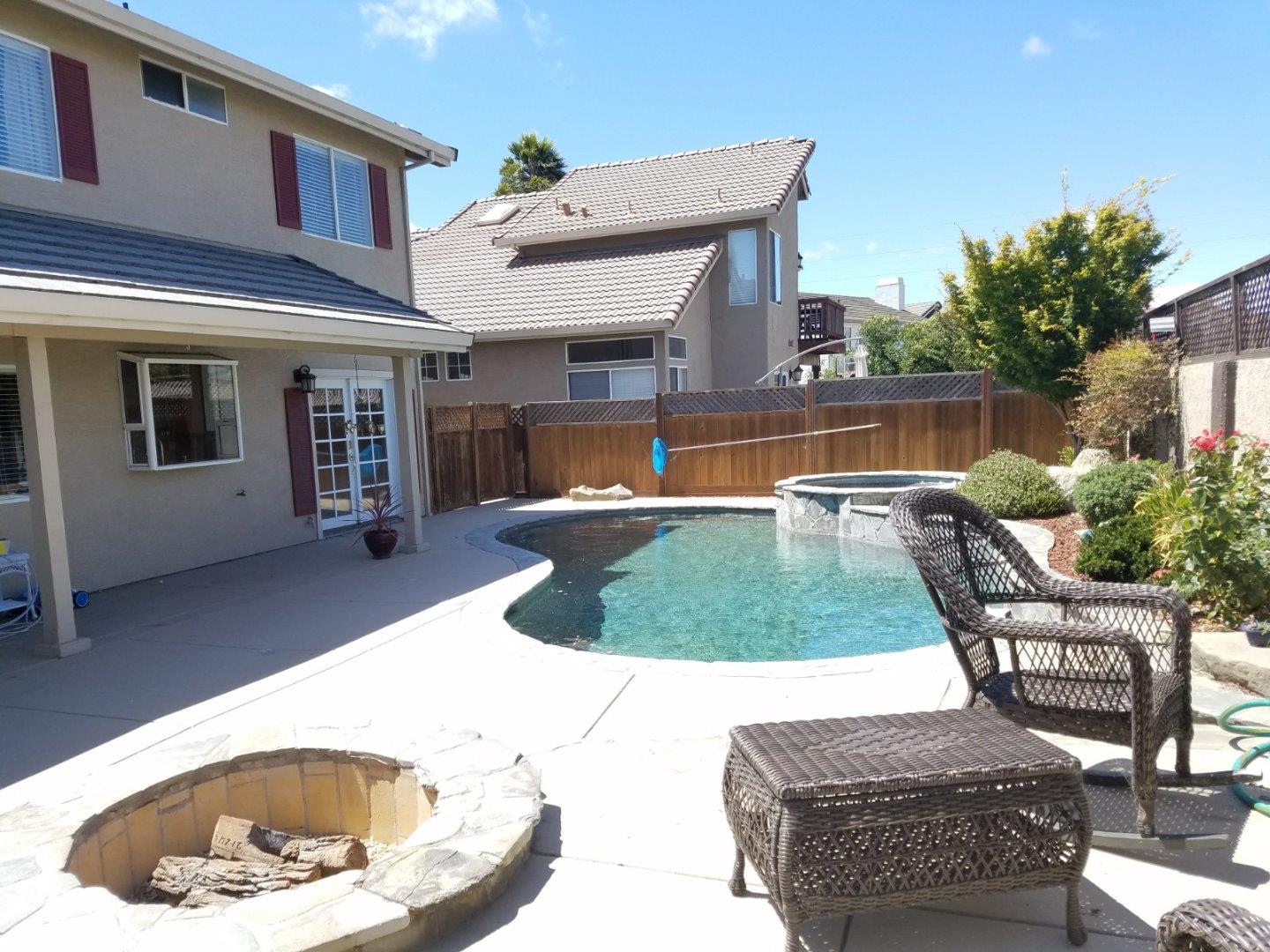 148 Greenbriar Way Salinas, CA 93907 - Photo 3 of 29 a swimming pool with outdoor seating
