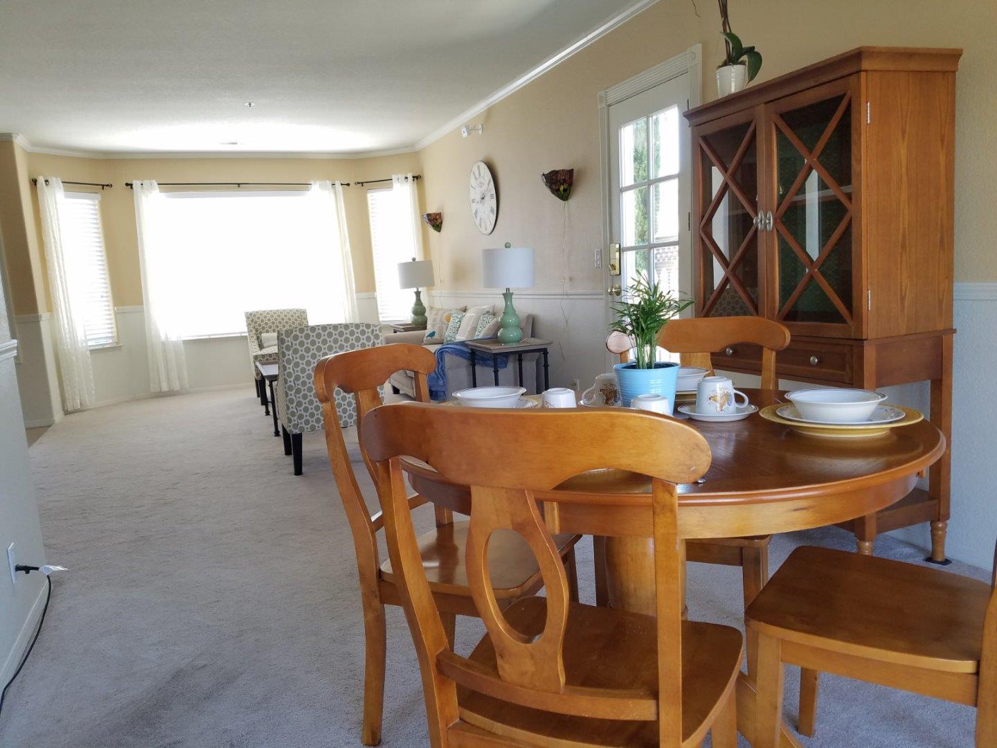148 Greenbriar Way Salinas, CA 93907 - Photo 8 of 29 a dining room with furniture and wooden floor