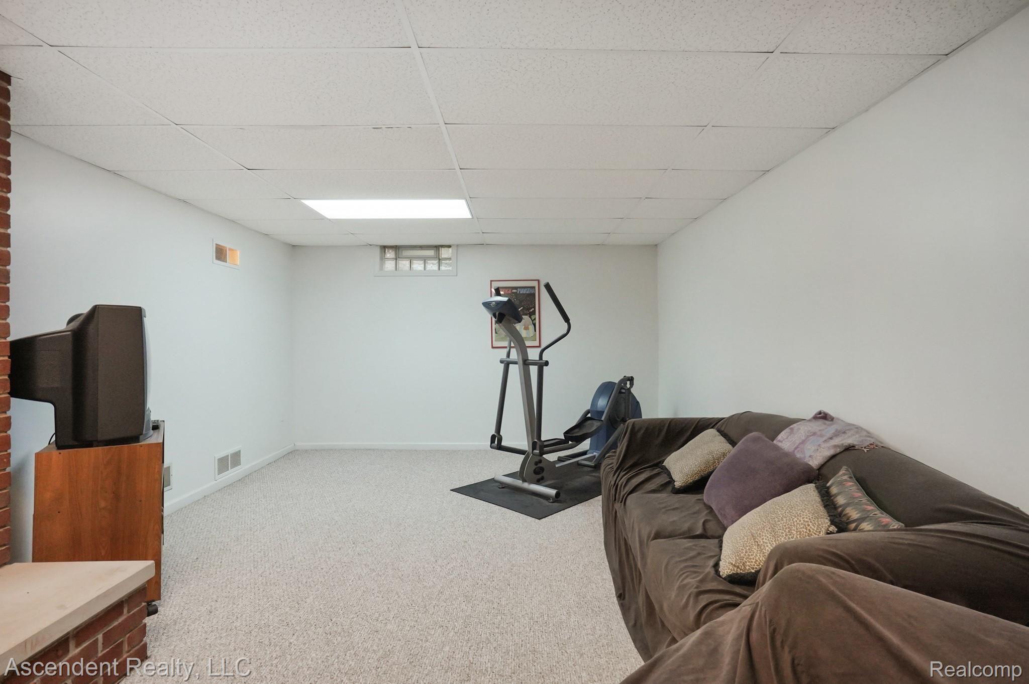 3075 Walnut Lake Road West Bloomfield, MI 48322 - Photo 33 of 39 Lower level hearth room