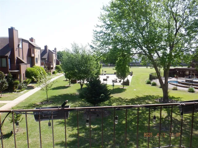 a view of a lake from a balcony
