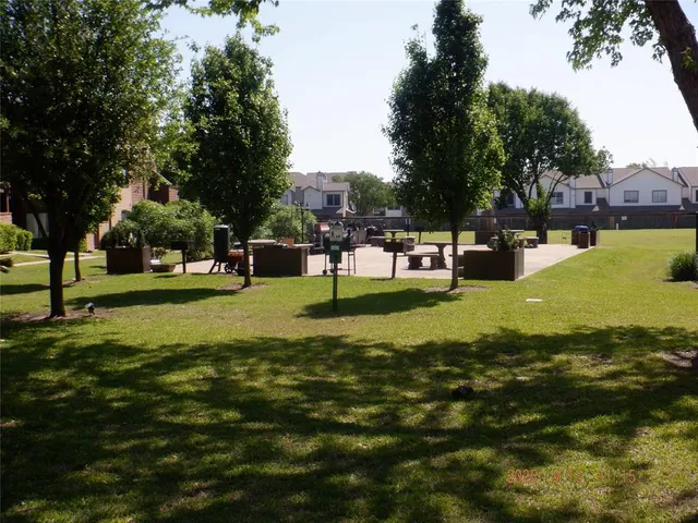a view of a park with trees