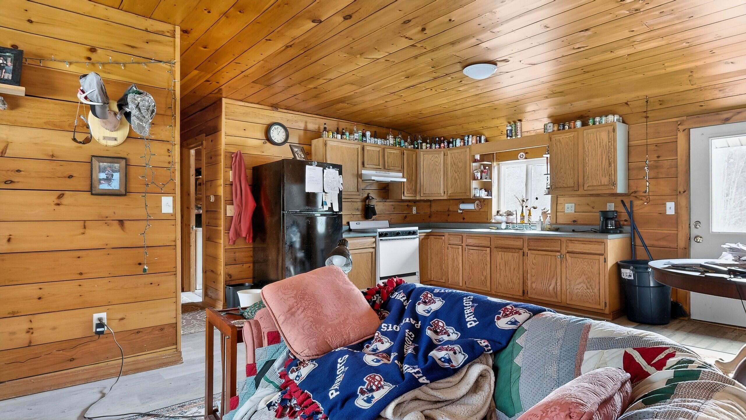 69 Old Orchard Road Buxton, ME 04093 - Photo 27 of 54 Living room, kitchen, dining